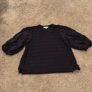 Woman’s black shirt